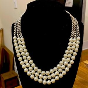 Beautiful Ralph Lauren Three row white faux pearl necklace. Silver tone chain.